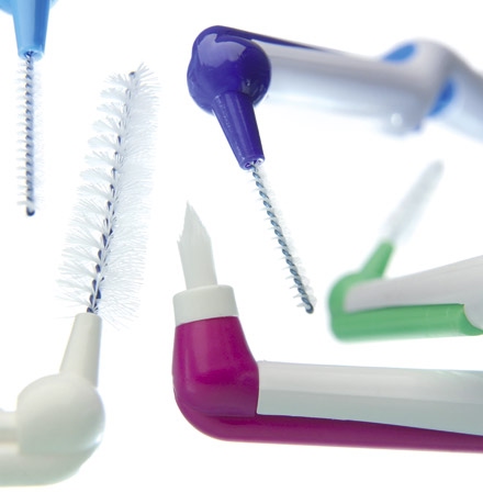 Best Interdental aids for keeping teeth and dental implants clean 